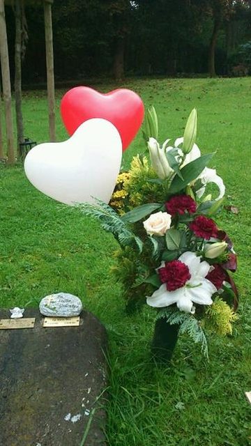 Blumen am Grab